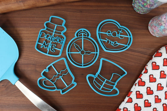 Alice's Adventures In Wonderland Storytime Cookie Cutters - Chipped Tea Cup, Drink Me Potion, Eat Me Cookie, Mad Top Hat, Pocket Watch - Bed